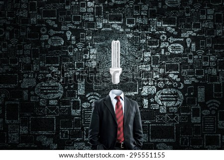 Idea concept with businessman and light bulb instead of his head