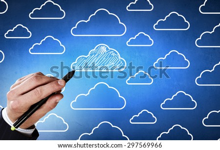 Close up of male hand drawing cloud computing concept