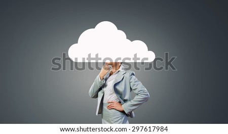 Businesswoman standing with cloud instead of head
