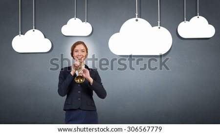Cheerful businesswoman playing fife on color background