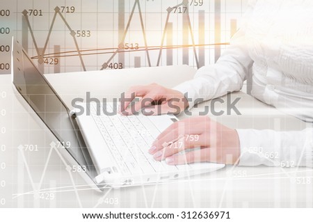 Close up of male hands typing on laptop keyboard