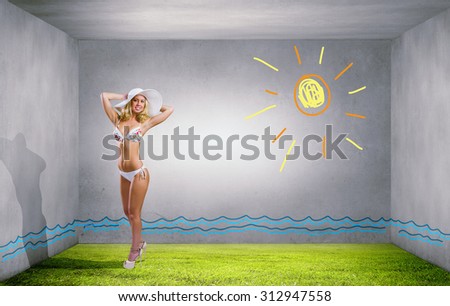 Young hot woman in hat and bikini on colorful background