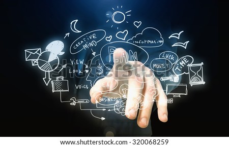Male hand pointing with finger at business plan on screen