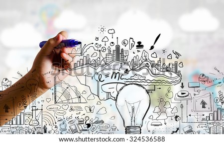 Close up of businessman drawing business sketches on screen
