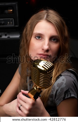 woman with  gold microphone