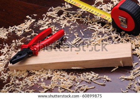 Shavings of wood, brick and roulette for measuring