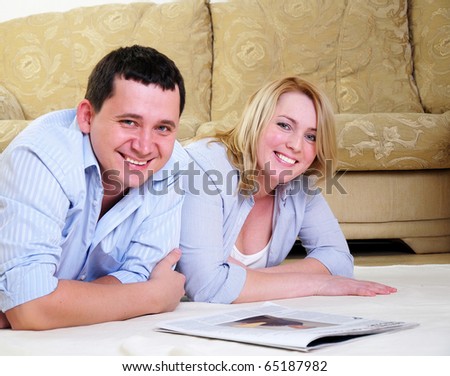 A young couple spends time together in the interior