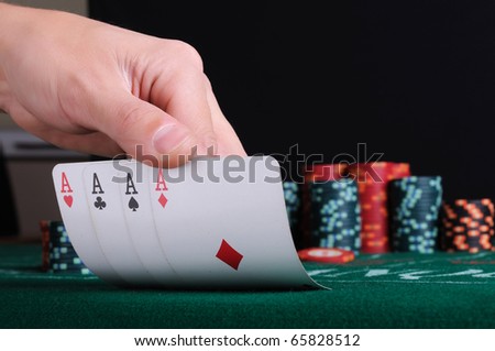 Place a poker player. chips and cards.