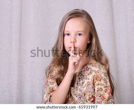 Portrait of a young beautiful girl. Girl various hand gestures.