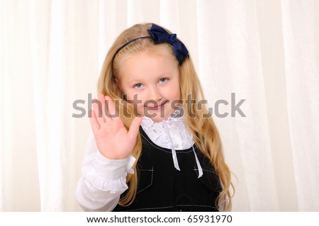 Portrait of a Young beautiful girl making hand gestures