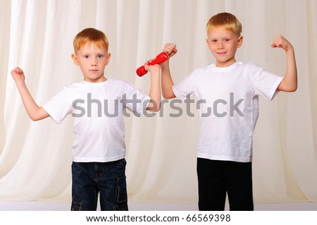 Two red twin brother have fun together