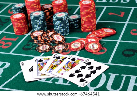 Place a poker player. chips and cards.