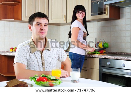 Young couple at breakfast together early in the morning