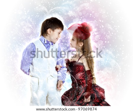 Portrait of boy and girl all dressed up