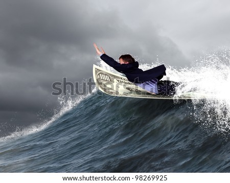 Image of a businessman surfing on the sea waves