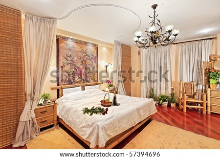 Medieval style bedroom with canopy bed on wide angle view