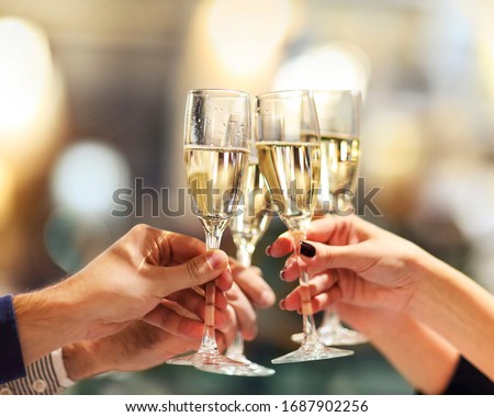 Similar – Image, Stock Photo Couple toasting with glasses of champagne in park