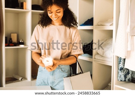 Similar – Image, Stock Photo Woman holding a candle at night, during the Easter celebrations