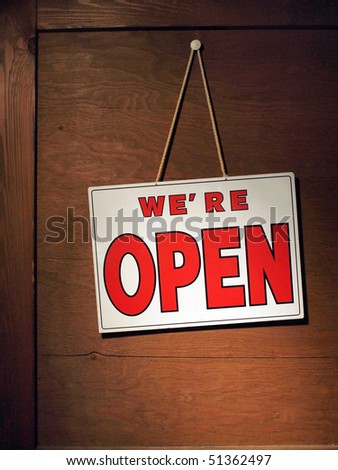 We are open door sign on wooden door
