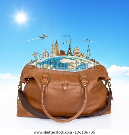 Travel bag full of famous monuments representing holidays
