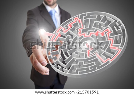Businessman touching digital interface with his fingers