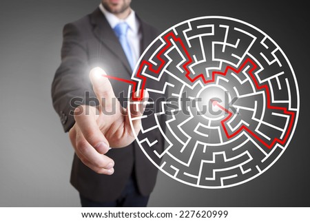 Businessman touching digital interface with his fingers