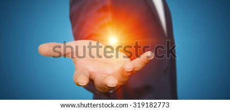 Businessman in his office holding with powerful light in his hand