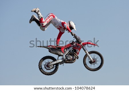 GALWAY, IRELAND - MAY 26: Dave Wiggins freestyle motocross rider jumps through the air during The  Extreme Stunt Show on May 26, 2012 in Galway, Ireland