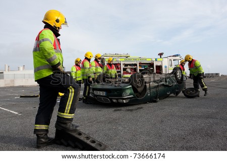 GALWAY, IRELAND-MARCH 9: Galway Fire and Rescue Emergency Units at car crash training on March 9, 2011 in Galway, Ireland.