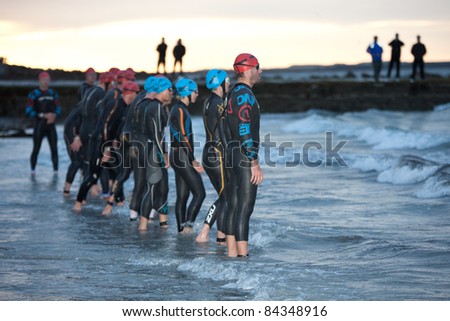 GALWAY, IRELAND - SEPT 4: Pro athletes prepare to start at first Edition of Galway Iron Man Triathlon on September 4, 2011 in Galway, Ireland