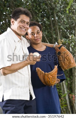 Teenage boy with proud father