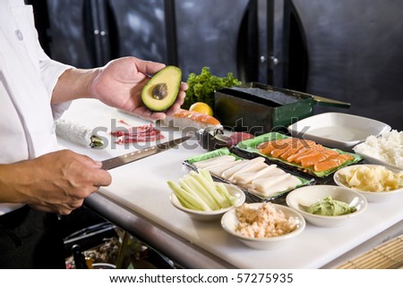 Similar – Image, Stock Photo Crop chef preparing sushi at table in restaurant