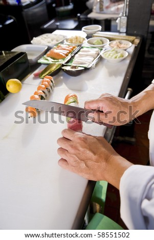 Similar – Image, Stock Photo Crop chef preparing sushi at table in restaurant