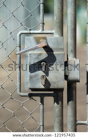 Metallic outside doorknob with two locks for security