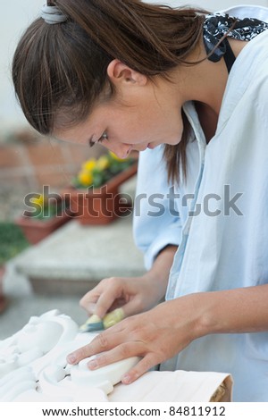 young women engaged in manual work