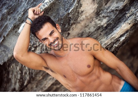 Portrait of an attractive young model on a tropical beach
