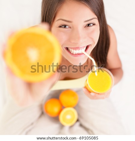 Similar – Image, Stock Photo Cheerful woman drinking fruit juice in cafe
