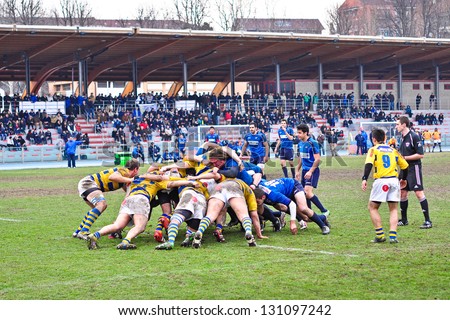 TURIN - MARCH 9: Teams engaged in a scrum during the second Derby della Mole between Cus Torino and Rugby Torino, on March 9, 2013 Turin, Italy.