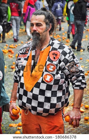 IVREA - MARCH 3: Carnival of Ivrea. The battle of oranges. An unidentified member of Chess team. On March 3, 2014 Ivrea, Italy.