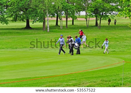 TURIN - MAY 8: BMW Italian Open. Matteo Manassero and Robert Rock are walking to the next hit on the green during round three. May 6-9, 2010 Royal Park I Roveri Turin, Italy.