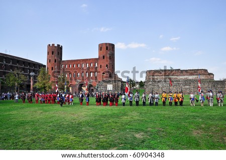 TURIN - SEPTEMBER 12: Soldiers reenactors stands at attention to the people during the reenactment of siege of Turin, september 1706. September 11-12, 2010 (Turin), Italy.