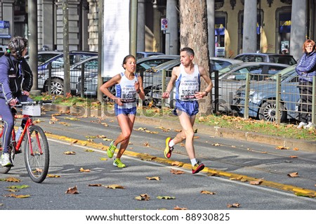 TURIN - NOVEMBER 13: Runners of the Esercito team, Rutigliano and Maraoui during the international competition Turin Marathon. November 13, 2011 Turin, Italy.
