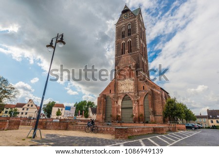 Similar – Image, Stock Photo Marienkirche in Wismar in the sunset.