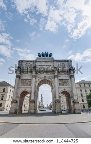 The Victory Gate (Siegestor), a three-arched triumphal arch crowned with a statue of Bavaria with a lion-quadriga in Munich, Germany