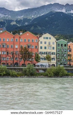 INNSBRUCK, AUSTRIA - AUG 14: Inn river, a 517 kilometres long tributary of the Danube on its way through the capital of Tyrol region on Aug 14, 2013 in Innsbruck, Austria.