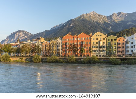 INNSBRUCK, AUSTRIA - AUG 16: Inn river, a 517 kilometres long tributary of the Danube on its way through the capital of Tyrol region on Aug 16, 2013 in Innsbruck, Austria.