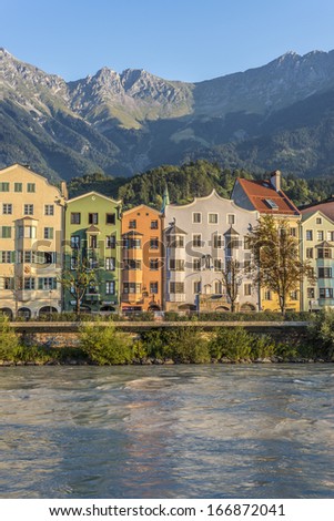 INNSBRUCK, AUSTRIA - AUG 16: Inn river, a 517 kilometres long tributary of the Danube on its way through the capital of Tyrol region on Aug 16, 2013 in Innsbruck, Austria.