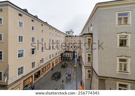 SALZBURG, AUSTRIA - JULY 30, 2014: Rainy day over Hagenauer Square in Salzburg, Austria.