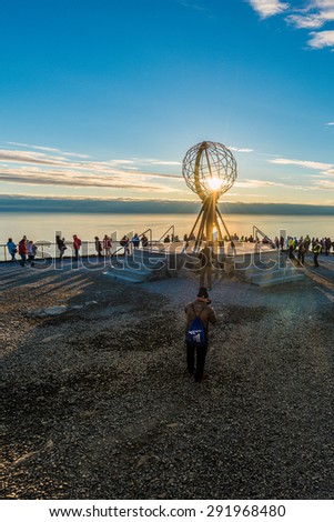NORTH CAPE, NORWAY - JUNE 30, 2014: People visiting North Cape (Nordkapp), on the northern coast of the island of Mageroya in Finnmark, Northern Norway.