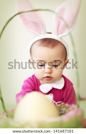 Baby in rabbit costume